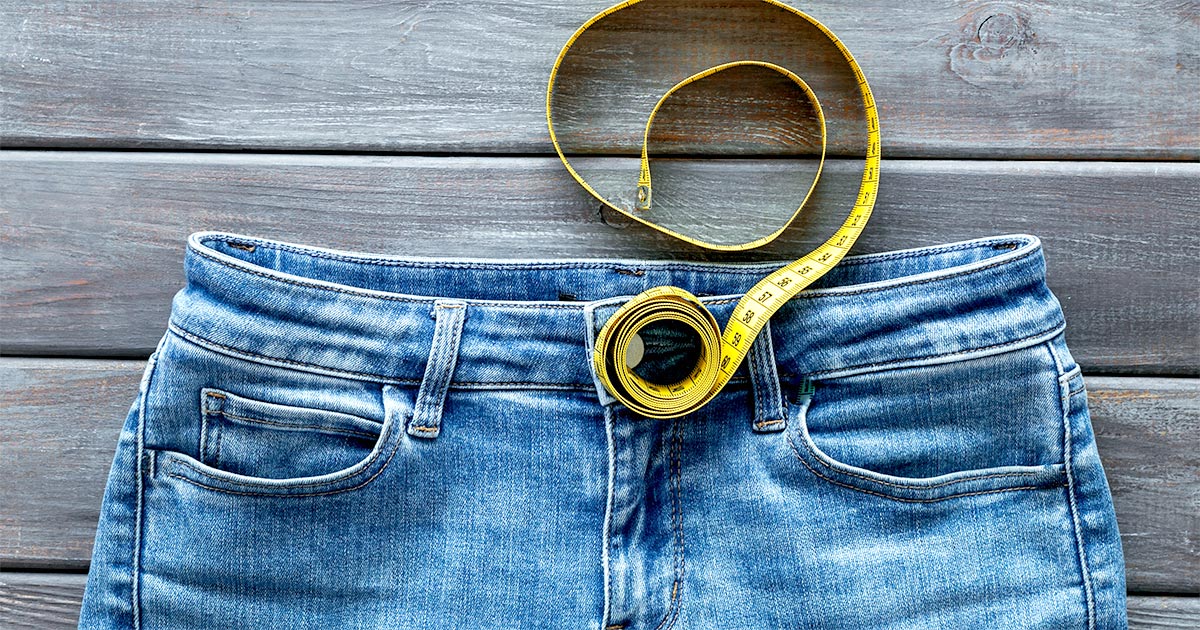 Jeans with measuring tape